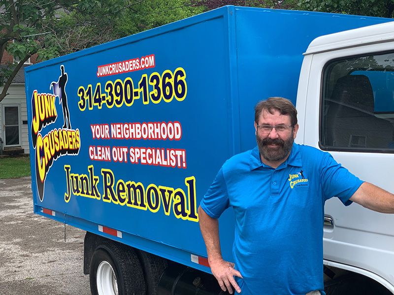 Junk Crusaders founder Dave Sturguess with his junk removal truck